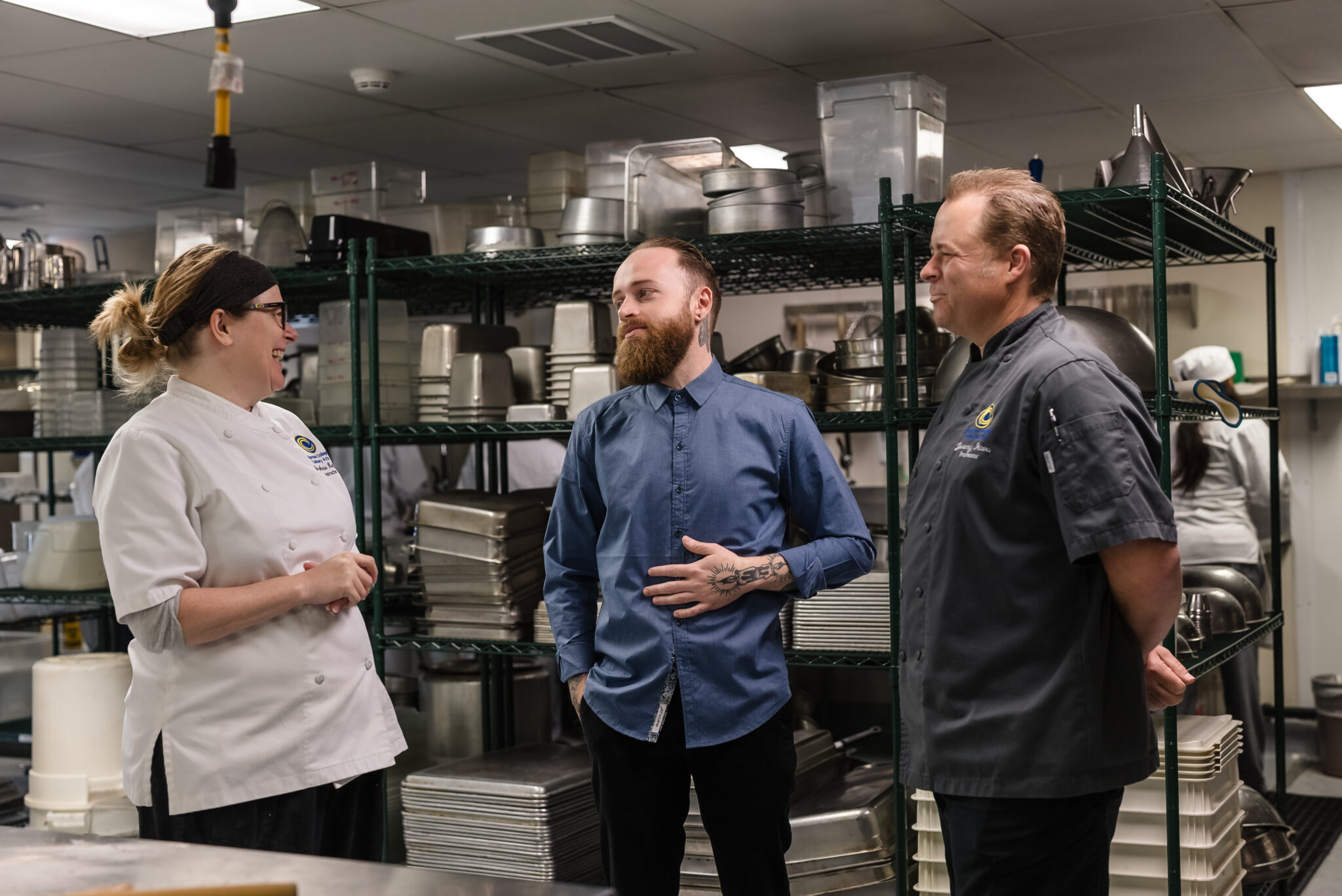 Johnathan Benvenuti talks to Culinary Arts instructors Chef Stephanie Rosati and Chef Jeremy Peters.