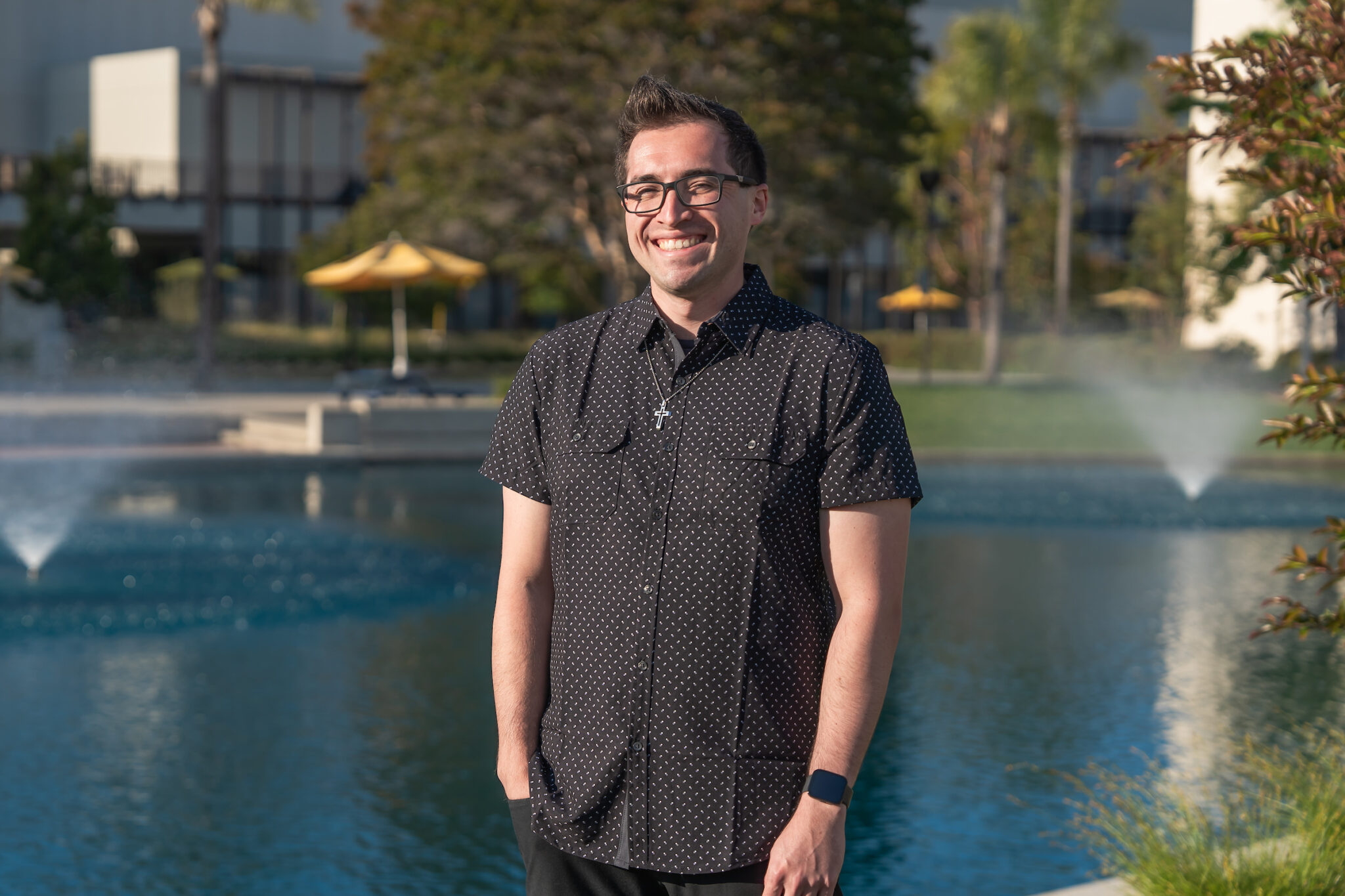 Taylor Schutt in front of the pond at Cypress College